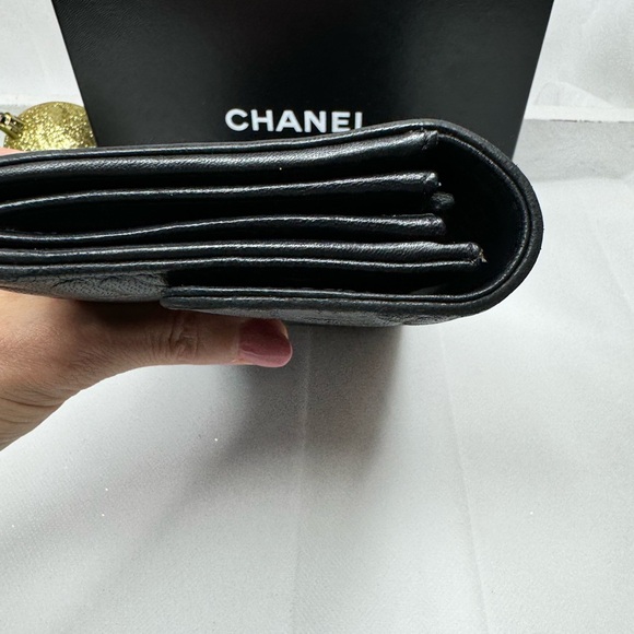 CHANEL 
Caviar Camellia Embossed Flap Wallet Black - Picture 11 of 14